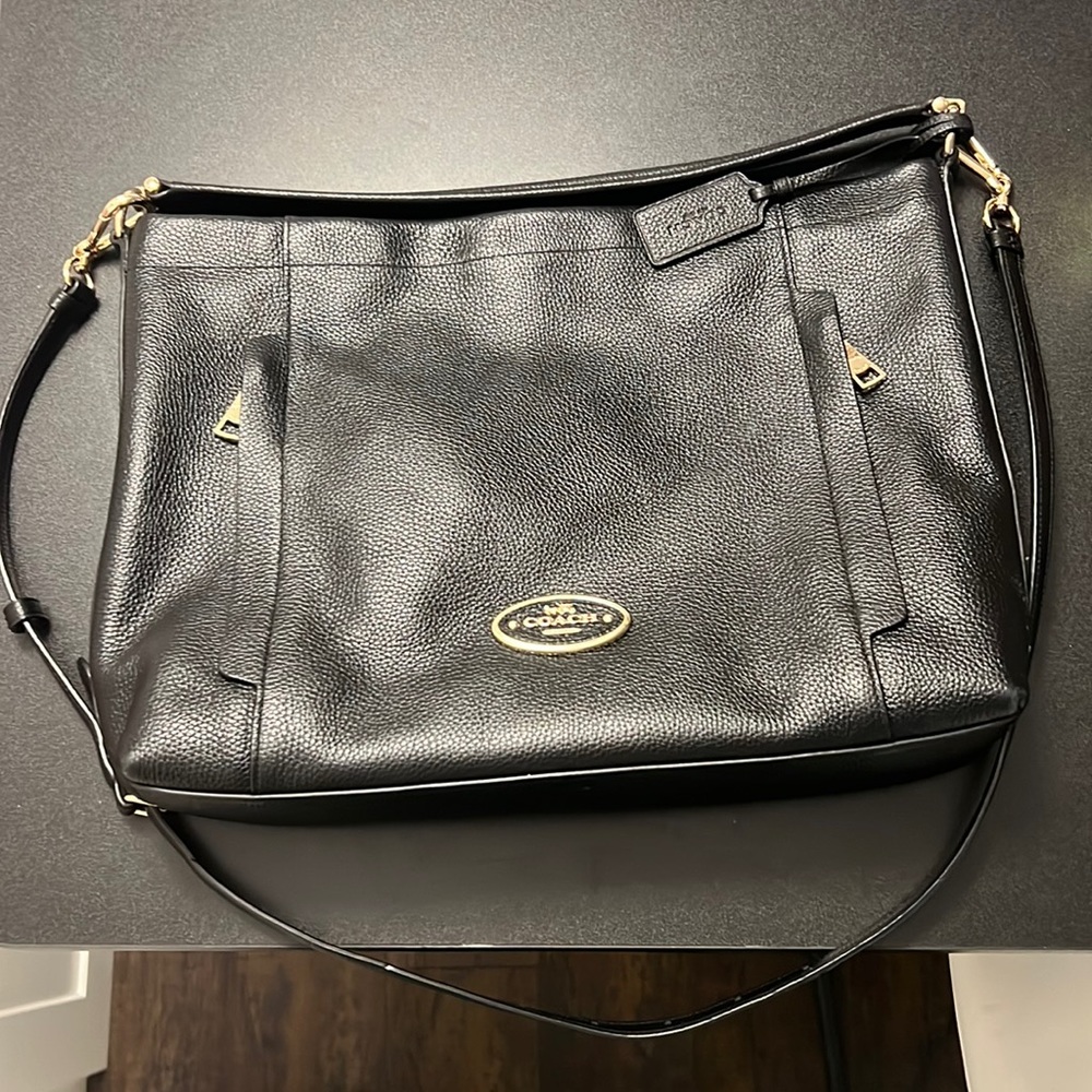 Like NEW black and gold COACH purse
